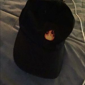 Hat with fire emblem.